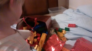 Our son's Christmas presents included a large bag of Duplo that we got for him at a local charity shop.